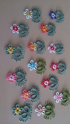 many different types of hair clips on a table