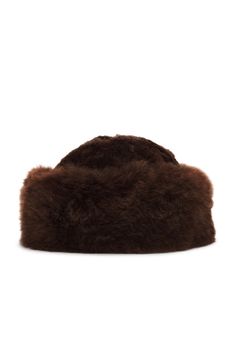 Genuine dyed alpaca fur.  Made in Peru, Fur origin: Peru.  Dry clean.  .  .  .  .  OS measures approx 23.55" in circumference.  .  .  .  .  .  .  .  . Fur Hat, Chow Chow, Alpaca, Peru, Dry Clean, Dye, The Originals, Hats