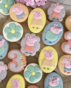 some peppa pig cookies are on a table