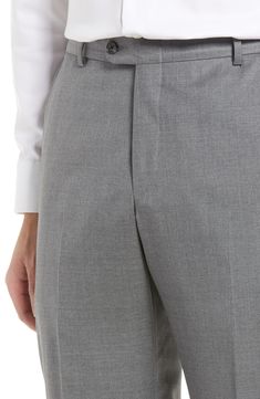 These relaxed trousers crafted from finely textured super-130s Italian wool are treated with beeswax to repel water, resist stains and enhance breathability. Style Name:Hickey Freeman B Series Honeyway Relaxed Fit Dress Pants. Style Number: 6229661. Solid Wool Pants With Welt Pockets, Wool Pants With Welt Pockets, Solid Wool Tapered Leg Pants, Classic Business Pants With Hidden Pockets, Solid Wool Business Pants, Wool Flat Front Pants, Relaxed Trousers, Fitted Dress Pants, Flat Front Pants