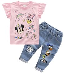 Minnie Mickey Kids 2Pc Set T-shirt + Jeans Elevate your child's summer style with this adorable Minnie Mickey Mouse 2-piece clothing set. Crafted for comfort and cuteness, this set includes a charming cartoon-themed T-shirt paired with trendy jeans pants. Ideal for both baby girls and boys, this tracksuit ensemble ensures your little one is fashion-forward and ready for any adventure. Whether it's a playdate or a family outing, this summer outfit is a must-have addition to your children's wardro Trendy Spring Playtime T-shirt, Spring Character Print Short Sleeve Sets, Spring Short Sleeve Sets With Character Print, Family Matching Cartoon Print Sets For Summer, Family Matching Sets With Cartoon Print For Summer, Playful Cotton Sets With Cartoon Print, Playful Cotton Cartoon Print Sets, Summer Family Matching Sets With Cartoon Print, Summer Letter Print Sets For Playtime