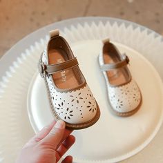 Your little princess will feel like royalty in these enchanting Cut Out Design Princess Shoes! ✨ Made with a soft PU upper and durable cow muscle outsole, these Mary Jane-style shoes are perfect for twirling, dancing, and all kinds of magical adventures. The charming cut-out design adds a touch of elegance, while the flat heel ensures comfort for all-day wear. These shoes are perfect for dressing up for special occasions or adding a touch of sparkle to everyday outfits. Available in a variety of Spring Non-slip Mary Janes, Summer Closed Toe Mary Janes With Soft Sole, Cute Mary Janes With Rubber Sole And Round Toe, Spring Mary Janes With Soft Sole And Round Toe, White Round Toe Mary Janes For Spring, White Mary Janes With Round Toe For Spring, Cream Color Mary Janes For Spring With Round Toe, Cream Mary Janes For Spring With Round Toe, Spring Cream Mary Janes With Round Toe