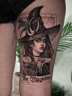 a woman wearing a witches hat and holding a cat on her thigh with the caption, the magician