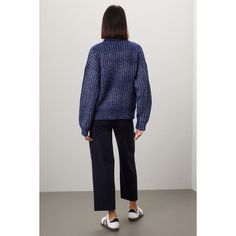 Blue knit (3% Wool, 51% Acrylic, 46% Polyester). Sweater. Long sleeves. Turtleneck. Pull on. 22.5" from shoulder to hemline. Imported. Navy Long Sleeve Sweater For Work, Blue Textured Knit Wool Sweater, Blue Turtleneck Sweater With Ribbed Cuffs, Blue Knit Cardigan With Ribbed Cuffs, Relaxed Fit Knit Top For Workwear In Fall, Blue Cardigan With Ribbed Cuffs For Fall, Blue Ribbed Collar Top For Fall, Blue Textured Knit Outerwear, Blue Knitted Wool Tops