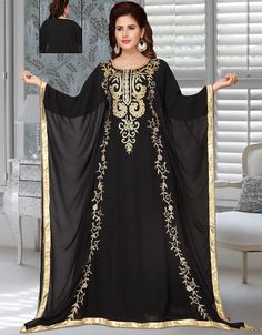 There’s no going wrong with an outfit this pretty! ✨ Modest Black Golden Embroidered Georgette Farasha Grab it Now: https://bit.ly/3iBdKTJ Apply Code: BUY3GET4 and Buy 3 get 1 free #fancykaftandress #indiankaftandress #kaftanabayadress #kaftandressdubai #kaftandressesindia #arabicattire #caftan Designer Kaftan, Plus Size Lehenga, Black Kurti, Arabian Dress, Modest Evening Dress, Embroidered Kurti, Zari Embroidery, Indian Saree Blouse, Plus Size Suits