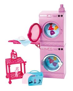 a pink toy washing machine with its door open