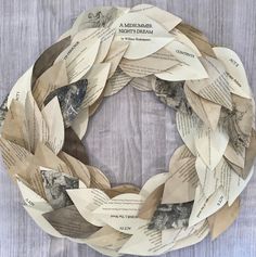 a wreath made out of old book pages