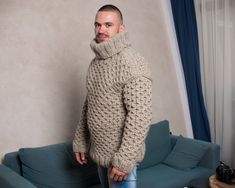 "MATERIAL : 3 strands of 100 % soft wool COLOUR : Eco beige ( There may be a slight difference because of the different monitors' representation) ♥ In the picture the model is wearing a garment with these measurements : A: ( Body lenght) : 28.3 \" / 72 cm B: ( Chest width) : 21.3 \" / 54 cm C: (Sleeve from under the arm) : 23.2 \" / 59 cm D: (Neck unrolled) : 13.8 \" / 35 cm They are taken with the item laid flat and not streched. ♥ For choosing your size please look at size chart in our listing Beige Knitted Turtleneck Sweater, Beige Hand Knitted Turtleneck Sweater, Beige Knitted Merino Wool Sweater, Hand Knitted Merino Wool Cream Sweater, Cream Wool Hand-knitted Sweater, Hand Knitted Wool Cream Sweater, Cream Hand Knitted Wool Sweater, Hand-knitted Cream Wool Sweater, Beige Merino Wool Sweater For Winter