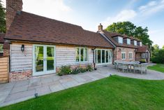 an outside view of a house with a patio