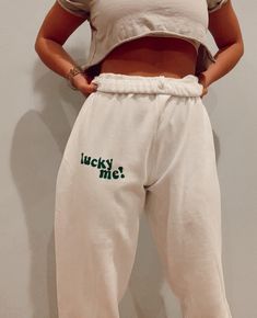 "LIMITED EDITION ST. PATRICL'S DAT JOGGERS - White joggers with green text \"LUCKY ME!\" design. Sizing: -All sizes are UNISEX though run closer to Women's sizing. We suggest to size up for a looser fit. -Please see size chart in photos. Material: -50% Cotton/ 50% Polyester -Machine wash with cold water Matching sweatshirts are also available and can be purchased as a set here: https://www.etsy.com/your/shops/AllDyedUpCo/tools/listings/827020933 **PLEASE REVIEW RETURN POLICY PRIOR TO PLACING AN Aesthetic Sweatpants, Sweatpants Aesthetic, Trendy Sweatpants, Matching Sweat Set, Tie Dye Loungewear, Trendy Joggers, Cute Sweats, Pajamas Aesthetic, Graphic Sweatpants