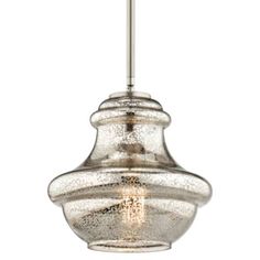 a light that is hanging from a ceiling fixture with a glass shade on it's side