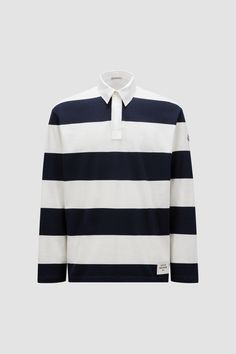 Crafted with contrasting colored stripes, this polo shirt embraces the collection's rugby-inspired aesthetic. The classic style is made from cotton jersey with long sleeves. Classic Striped Polo Sweater With Polo Collar, Classic Long Sleeve Polo Shirt With Contrast Stripes, Casual Cotton Polo Sweater With Contrast Stripes, Cotton Long Sleeve Polo Shirt With Contrast Stripes, White Long Sleeve Polo Sweater With Striped Collar, Striped Cotton Polo Sweater, Cotton Polo Sweater With Contrast Stripes, Cotton Polo Sweater With Striped Collar, White Polo Shirt With Striped Cuffs