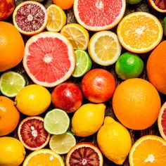 an assortment of citrus fruits including grapefruit, limes and oranges are shown