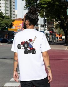 Our Unisex T-shirts are High Quality, SUPER comfy and Durable. Stylish Design and Relaxed Fit go Great with any Causal Occasion! They are made from 100% Cotton and hand-drawn. NO AI!   FABRICATION *Made with medium fabric (5.3 oz/yd² (180 g/m consisting of 100% cotton for year-round comfort that is sustainable and highly durable. *The tear-away label means a scratch-free experience with no irritation or discomfort whatsoever. *Made using 100% US cotton that is ethically grown and harvested. Gildan is also a proud member of the US Cotton Trust Protocol ensuring ethical and sustainable means of production. This blank tee is certified by Oeko-Tex for safety and quality assurance.   SIZING Unsure about sizing? Please Refer to the Size Chart below. S - Width cm: 45.72 - Length cm: 71.12 - Sleev White Relaxed Fit T-shirt For Outdoor Activities, Biker Style Short Sleeve T-shirt For Streetwear, Urban Tops With Graphic Print For Outdoor, Urban Style Tops With Graphic Print For Outdoor Activities, Biker Graphic Print Short Sleeve T-shirt, Graphic Crew Neck T-shirt For Urban Adventures, Biker Style Short Sleeve T-shirt With Front Print, Urban Crew Neck T-shirt For Outdoor Activities, White T-shirt With Front And Back Print For Fans