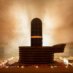 a large black object sitting in the middle of a room