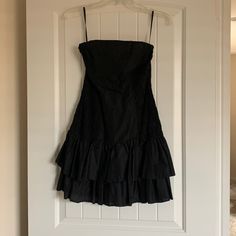 Brand New With Tags Black Ruffle Mini Dress Strapless Size 4 - Can Also Fit Size Small Black Mini Dress Fall, Babydoll Black Dress, Black Strapless Dress With Ruffles For Summer, Black Strapless Summer Cocktail Dress, Spring Black Strapless Dress With Ruffles, Black Strapless Dress With Ruffles For Spring, Black Strapless Mini Dress For Spring, Black Strapless Dress For Spring, Black Strapless Dress For Spring Cocktail