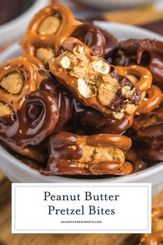 peanut butter pretzel bites in a white bowl with chocolate and nuts on top