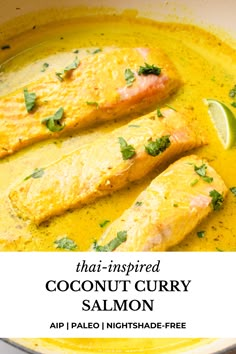 coconut curry salmon in a bowl with lime and cilantro