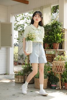 Button up shirt with short puff sleeves, frilled peter pan collar and embroidered floral vines along the front. S: 14.5" across shoulders, 37" chest, 22" lengthM: 15" across shoulders, 38.5" chest, 22" lengthL: 15.5" across shoulders, 40" chest, 22" length Casual Doll Collar Blouse For Spring, Casual Doll Collar Blouse For Summer, Casual Lace Collar Blouse For Spring, Casual Peter Pan Collar Blouse For Spring, Floral Embroidered Doll Collar Blouse For Summer, Summer Blouse With Floral Embroidery And Doll Collar, Summer Floral Embroidery Doll Collar Blouse, Floral Embroidery Doll Collar Blouse For Summer, Summer Blouse With Peter Pan Lace Collar