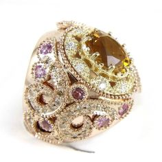 This Is A Huge Wide Oval Citrine Ring W/Diamond & Kunzite Accents. It Is Made Of 100% Natural 14kt Rose Gold And Is In Brand New Condition. It Has A Ctw Of 6.50ct (1.34 Diamond/5.16 Citrine + Kunzite) And Weighs 23.5 Grams. The Fancy Diamonds Have A Clarity Of Si1 And F Color. This Custom Piece Has An Excellent Oval Cut Citrine Stone, Surrounded By A Diamond And Pink Sapphire Accents That Have A Filigree Design Around The Band Of This Huge Ring. Luxury Morganite Jewelry In White Gold, Luxury White Gold Morganite Jewelry, Luxury Topaz Rings With Rose Cut Diamonds, Luxury Morganite Gemstone Jewelry, Luxury Morganite Jewelry With Center Stone, Exquisite Morganite Jewelry With Accent Stones, Luxury Gold Morganite Jewelry, Exquisite Morganite Rings, Exquisite Gold Morganite Jewelry