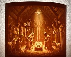 an illuminated nativity scene with the birth of jesus