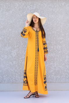 **Note : The kaftan in the video is a different color of the exact same Kaftan and is only displayed to show the fit, flow, and cut of the Kaftan. You will receive the one in the pictures.** This bohemian embroidered dress is a an eye catcher! It is an extremely comfortable wear, light and soft and can be used on many occasions -  home gatherings, festival parties, summer occasions, dinners, or just in your home to feel comfortable.  Fabric : 70% Egyptian Cotton; 30% Polyester. Small (Size 4/6 U Bohemian Dresses With Dabka Work, Bohemian Floor-length Dress With Embroidered Border, Traditional Maxi Length Spring Abaya, Eid Maxi Dress With Intricate Embroidery, Yellow Dress With Intricate Embroidery For Eid, Summer Long Sleeve Kaftan With Dabka Work, Spring Embroidered Maxi Length Abaya, Yellow Floor-length Dress With Dabka Work, Bohemian Maxi Dress With Dabka Work