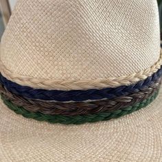 Beautiful braided horse hair designed into these stunning hat bands. Finished with double horse hair tassels. Adjustable size for SM-XL hats. Colors: white, black, grey, brown, emerald green and navy blue. size: 8-10mm wide. Western Braided Hat Band With Flat Brim, Braided Western Hat Bands, Western Style Braided Hat Bands For Flat Brim, Braided Western Fedora Hats, Western Braided Fedora Hats, Braided Western Hat Bands For Rodeo, Western Braided Hat Bands For Rodeo, Western Braided Hat Band For Ranch, Western Braided Fedora With Short Brim