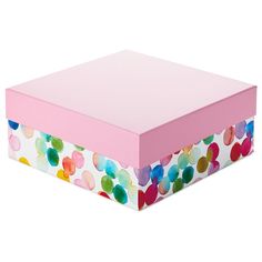 a pink box with multicolored polka dots on it