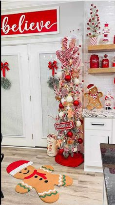 a christmas tree decorated with candy canes, gingerbread cookies and other holiday decorations