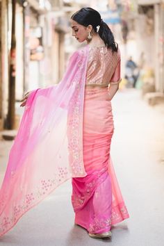 Peach, pink saree with floral, sequin, cutdana embroidery. Comes with unstitched blouse piece.
Components: 2
Pattern: Embroidered
Type Of Work: Floral
Fabric: Chiffon
Color: Pink, Peach
Other Details: 
Floral embroidery
Note: The stitched blouse worn by the model is not for sale
Occasion: Destination Wedding - Aza Fashions Peach Pink Saree, Cutdana Embroidery, Pink Chiffon, Pink Peach, Pink Saree, Peach Pink, Blouse Piece, Floral Fabric, Aza Fashion