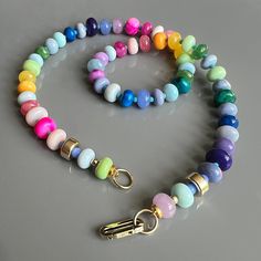 The Color Burst necklace is similar to the "chunky rainbow" necklace, but the organization of the colors is differnet. Additionally, Color Burst also features a 14k snap-close link clasp. Now it's easier than ever to add your own charms!  The Color Burst necklace offers an eye-catching array of opal, chrysocolla + chal Trendy Handmade Necklace For Everyday Use, Multicolor Necklace With Lobster Clasp, Multicolor Beaded Jewelry For Everyday Use, Unique Multicolor Jewelry For Everyday Use, Multicolor Round Beads Necklace For Everyday, Gold Gemstone Necklace, Color Burst, Rainbow Necklace, Unique Bracelets