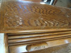 an old wooden dresser with wood grain on it