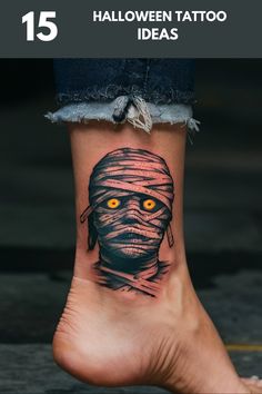 a person's foot with a tattoo on it and the words, halloween tattoo ideas