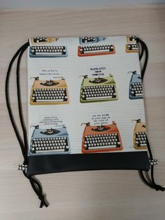 an old - fashioned typewriter print drawstring bag