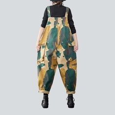 Unveil your inner style icon with our signature military-inspired Y2K cargo jumpsuit from the 2023 Spring-Summer Collection!Why You'll Fall In LoveInspired by the legendary fashion sense of the Y2K era. this jumpsuit features a harmonious blend of nostalgia and modern fashion. Every detail. from its vibrant painted prints to its sanded finish. will transform your look into a timeless masterpiece.Unmissable Highlights: Y2K Inspired: Step back into the millennium's iconic fashion scene with this j Khaki Cotton Jumpsuits And Rompers For Fall, Utility Overalls With Cargo Pockets For Summer, Fall Cargo Style Overalls, Casual Camouflage Jumpsuit For Spring, Casual Camouflage Jumpsuits And Rompers For Spring, Cotton Jumpsuits With Cargo Pockets For Fall, Summer Utility Jumpsuits And Rompers, Fall Cotton Jumpsuits With Cargo Pockets, Cotton Jumpsuits And Rompers With Cargo Pockets For Fall