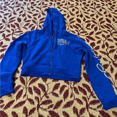 Ed Hardy Hoodie New With Tags Trendy Blue Stretch Hoodie, Blue Stretch Sweatshirt For Spring, Blue Stretch Hoodie Top, Blue Spring Hoodie, Trendy Blue Top With Drawstring Hood, Trendy Blue Tops With Drawstring Hood, Blue Stretch Hooded Tops, Blue Fitted Hoodie For Fall, Fitted Blue Hoodie For Fall