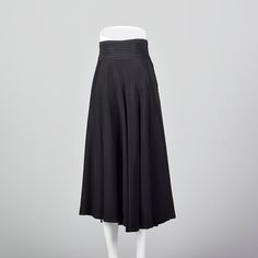 "This listing is for one skirt. Textile is unmarked. Full skirt with pleated waistband. This is a very lovely black skirt with a nice sweep. Beautiful drape and movement. Wide waistband with horizontal pleats. Left side zip with button and loop closures at the waistband. Size Marked: Unmarked Approximate Size: Medium **Please Check Measurements to be Sure! Fabric: Unmarked Lining Type: None Closure: Zip Label: Unmarked Condition: Excellent Era: 1950s Inventory#: DSC1018-1984 Measurements- Waist: A-line Pleated Evening Skirt, Evening Pleated Waist Midi Skirt, Evening Pleated Full Maxi Skirt, A-line Pleated Maxi Skirt For Evening, Evening A-line Pleated Lined Skirt, Evening A-line Pleated Maxi Skirt, Evening Skirt With Accordion Pleats, Evening Full Pleated Skirt, Evening Full Skirt With Pleated Waist