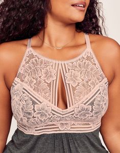 The Alaina slip provides support and coverage with a high-neck and racerback design in a soft, stretchy knit fabric. It's perfect for everyday wear, and the lace detail adds a touch of romance. (Available in plus-sizes XL-4X.) Feminine Stretch Camisole With Bra-friendly Design, Feminine Stretch Bra-friendly Camisole, Feminine Stretch Camisole Bra Friendly, Stretch Camisole Bra With Delicate Lace, Stretch Lace Trim Bra, Fitted Sleeveless Lace Bra, Delicate Lace Fitted Sleeveless Bra, Fitted Delicate Lace Bra, Stretch Lace Camisole Bra Friendly