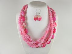 Chunky pink agate necklace, multi strand statement pink necklace, beaded agate necklace, pink beads, statement jewelry, matching earring, BEST SELLER Spring 2020 Fashion. A bold and dramatic statement necklace featuring pink agate gemstone beads. 5 STRAND, medium  weight.  $strands is crackle agate 8mm beads, 1 strand oval polished agate beads 18mm x 13mm. Silver plated lobster clasp. Measurements:  17" (46 cm) plus 4" extender. Contains small parts! Not for children! Choking Hazard! Please note Pink Agate Beaded Necklaces With Round Beads, Pink Agate Beaded Necklace With Round Beads, Beaded Agate Necklace, Pink Agate Jewelry With 8mm Beads, Pink Agate Beaded Necklaces, Pink Multi-strand Beaded Necklace, Pink Agate Beaded Necklace, Pink Adjustable Multi-strand Necklace, Pink Gemstone Necklace