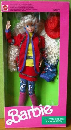 the barbie doll is dressed in red and blue