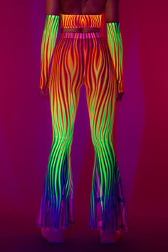 Experience the magic of the spectrum. These colorful flared pants fits like a second skin, accentuating your best assets with sheer coverage and and a captivating print. Complete the look with the matching mesh top and fingerless gloves. Designed to leave no place for ordinary, this rave set will take it up a notch.

FEATURES:

> High Waist 
> Flared Legs 
> See-Through Soft Mesh Fabric Multicolor Stretch Bottoms For Night Out, Stretch Multicolor Party Pants, Multicolor Stretch Pants For Party, Stretch Multicolor Pants For Party, Multicolor Rave Bottoms For Party, Rave Style Multicolor Party Bottoms, Rave Bottoms For Spring Night Out, Rave Multicolor Party Bottoms, Spring Rave Bottoms For Night Out