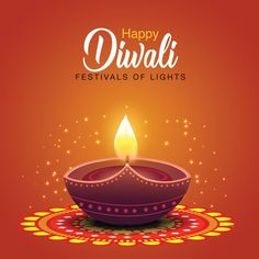 happy diwali festival with lit candle on colorful background