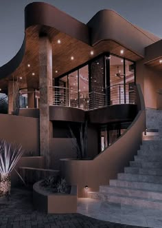 a modern house with stairs leading up to it