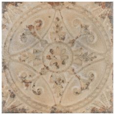 an old, worn and stained tile wallpaper with ornate designs on it's surface