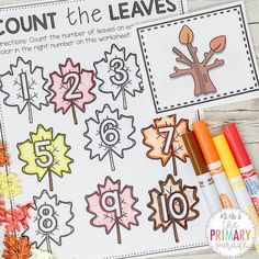 an autumn count the leaves game with markers and crayons