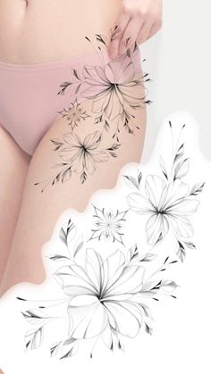 a woman's stomach with flowers drawn on it and the bottom part of her panties