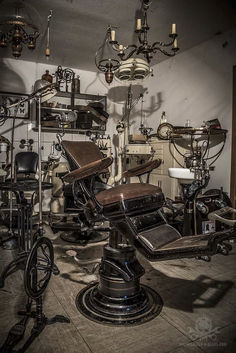 an old fashioned barber shop with lots of chairs