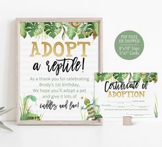 a sign and some scissors on a white table with a card that says adopt a reptile