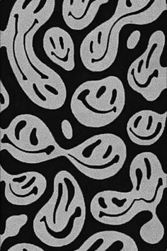 an abstract black and white pattern with swirls on the bottom, which has been drawn in