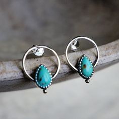 Silver hoop earrings embellished with genuine turquoise stone, perfect for adding a hint of bohemian beauty to any outfit. Size: 20 x 15 mm Post earrings Solid 925 sterling silver, genuine turquoise from Arizona By Sowell Jewelry. Stamped with 'SJ' and '925'. *Official site: sowelljewelry.com* SUBSTANTIAL PACKAGING: To ensure our packaging is as eco-friendly as possible, we only use recyclable materials such as paper and cardboard. Handmade Small Hoop Turquoise Jewelry, Bohemian Sterling Silver Hypoallergenic Hoop Earrings, Turquoise Dangle Jewelry Stamped 925, Turquoise Hoop Gemstone Jewelry, Turquoise Gemstone Hoop Jewelry, Turquoise Gemstone Hoop Earrings, Bohemian Hypoallergenic Hoop Jewelry, Turquoise Jewelry Stamped 925, Southwestern Hoop Jewelry As Gift